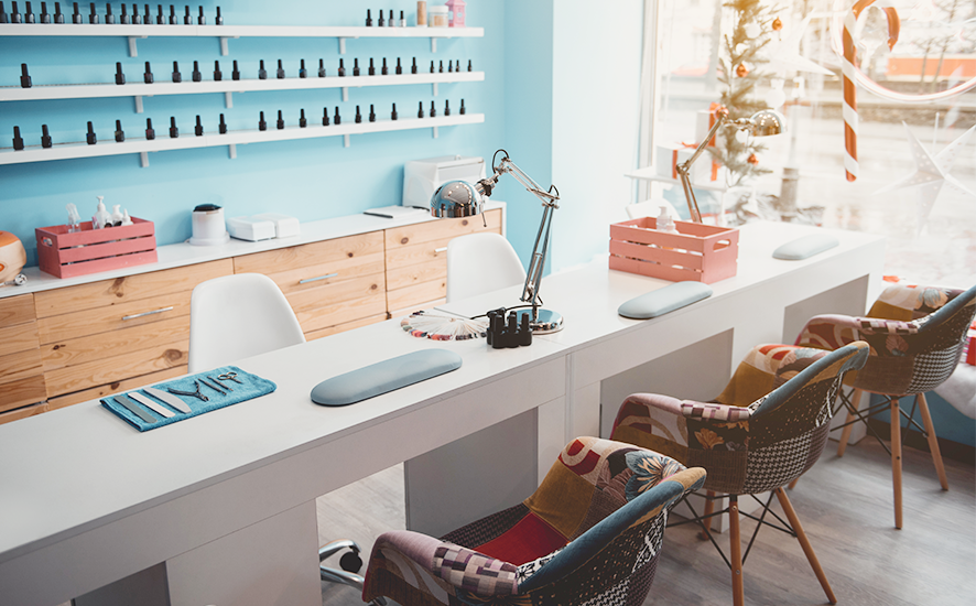 empty stations and chairs at a nail salon