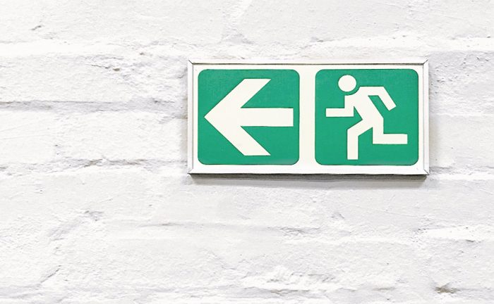 exit sign on a wall