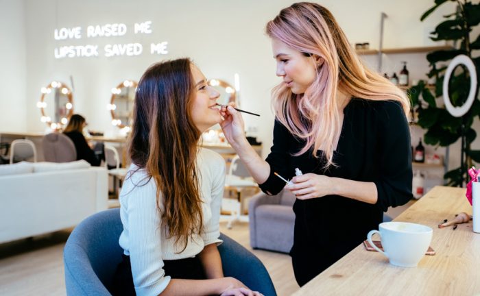 make up artist talking with the client