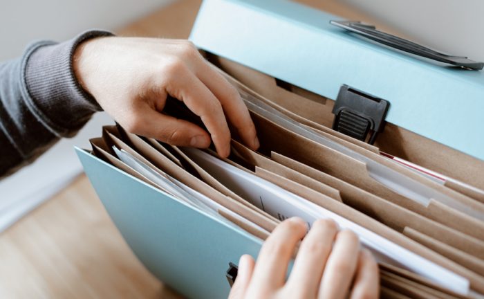 How should client records be stored in a salon